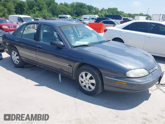 1996 Chevrolet Lumina z VIN 2G1WL52M6T9124713, wystawiony jako IAAI lot #42306378 z przebiegiem 140 750 mil mil oraz . Historia ofert i sprzedaży dostępna na DreamBid. Obrazek 1.