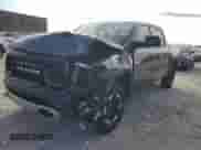 2021 Ram 1500 Rebel z VIN 1C6SRFLT0MN797874, wystawiony jako Copart lot #85874135 z przebiegiem 67 416 mil mil oraz Czysty tytuł • Clean title. Historia ofert i sprzedaży dostępna na DreamBid. Obrazek 1.