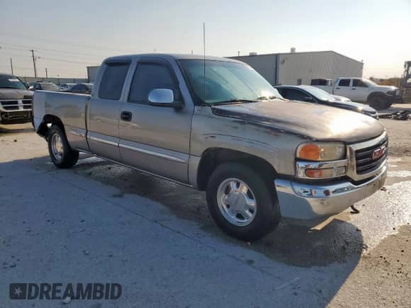 2000 GMC Sierra 1500 SLE with VIN 2GTEC19VXY1171355, listed as a Copart auction lot 67357465 with 340,576 mi miles and Salvage title. Bid and sale history available at DreamBid. Image 4.