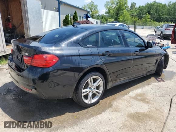 2015 BMW 4 Series 428i xDrive z VIN WBA4C9C54FD330937, wystawiony jako Copart lot #66156155 z przebiegiem 104 805 mil mil oraz Szkoda całkowita • Salvage title. Historia ofert i sprzedaży dostępna na DreamBid. Obrazek 3.