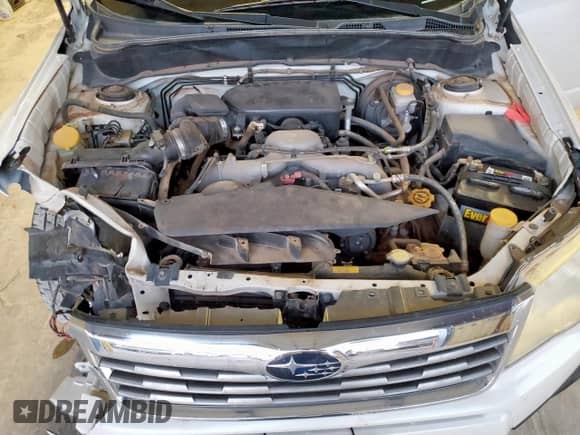 2009 Subaru Forester X with VIN JF2SH63609H786919, listed as a Copart auction lot 68872335 with 162,328 mi miles and Salvage title. Bid and sale history available at DreamBid. Image 12.