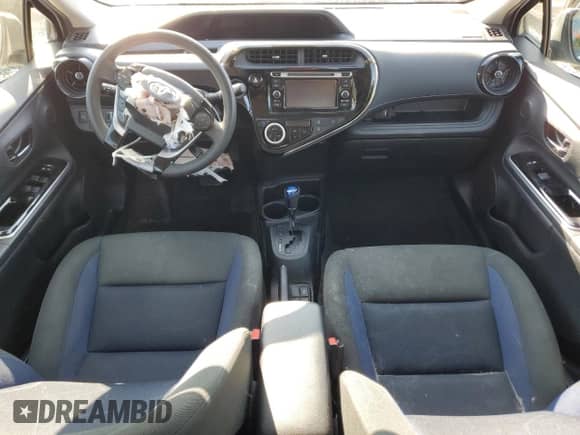 2018 Toyota Prius One z VIN JTDKDTB33J1607690, wystawiony jako Copart lot #80160245 z przebiegiem Nie podano mil oraz Szkoda całkowita • Salvage title. Historia ofert i sprzedaży dostępna na DreamBid. Obrazek 8.