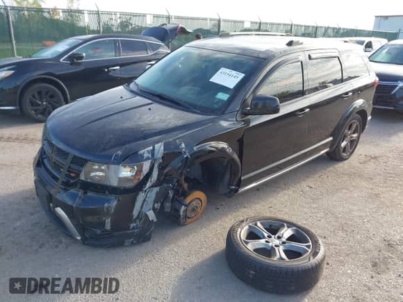 2017 Dodge Journey Crossroad Plus with VIN 3C4PDDGG6HT704232, listed as a IAAI auction lot 43154145 with 145,981 mi miles and . Bid and sale history available at DreamBid. Image 2.