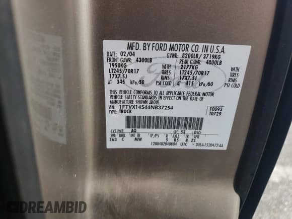 2004 Ford F-150 XL with VIN 1FTVX14544NB37254, listed as a Copart auction lot 58550985 with 256,441 mi miles and Salvage title. Bid and sale history available at DreamBid. Image 12.