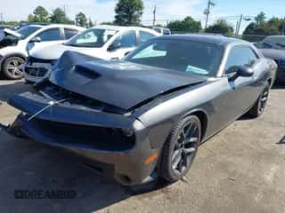 2023 Dodge Challenger GT with VIN 2C3CDZJG0PH587148, listed as a IAAI auction lot 43151734 with 14,241 mi miles and . Bid and sale history available at DreamBid. Image 2.