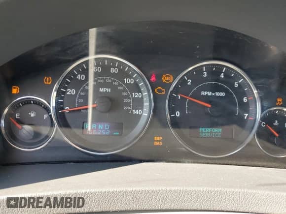 2007 Jeep Grand Cherokee Laredo with VIN 1J8GR48KX7C593322, listed as a Copart auction lot 71458485 with 166,252 mi miles and Salvage title. Bid and sale history available at DreamBid. Image 9.