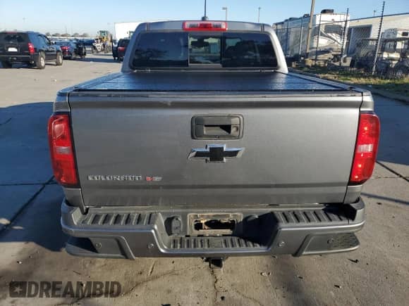 2020 Chevrolet Colorado 4WD Z71 with VIN 1GCGTDEN7L1229646, listed as a Copart auction lot 90466855 with 46,493 mi miles and Salvage title. Bid and sale history available at DreamBid. Image 6.