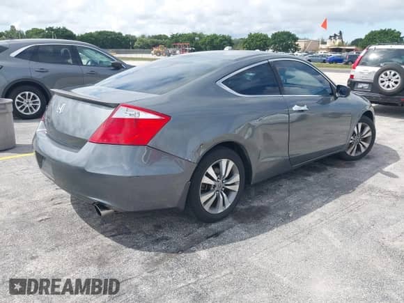 2010 Honda Accord LX-S with VIN 1HGCS1B36AA005561, listed as a IAAI auction lot 43280472 with 222,439 mi miles and . Bid and sale history available at DreamBid. Image 4.