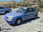 2002 Hyundai Accent z VIN KMHCF35G72U206880, wystawiony jako Copart lot #62286955 z przebiegiem 200 952 mil mil oraz Szkoda całkowita • Salvage title. Historia ofert i sprzedaży dostępna na DreamBid. Obrazek 1.