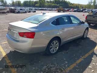 2019 Chevrolet Impala LT with VIN 1G11Z5SAXKU138128, listed as a IAAI auction lot 43350623 with 96,130 mi miles and . Bid and sale history available at DreamBid. Image 4.