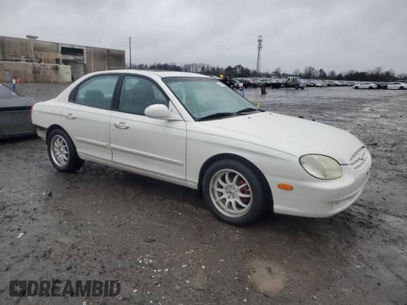 1999 Hyundai Sonata GLS z VIN KMHWF35VXXA049804, wystawiony jako Copart lot #44175995 z przebiegiem 123 322 mil mil oraz Szkoda całkowita • Salvage title. Historia ofert i sprzedaży dostępna na DreamBid. Obrazek 4.