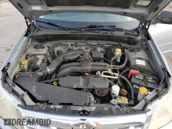 2013 Subaru Forester X z VIN JF2SHABC0DH413379, wystawiony jako Copart lot #81877155 z przebiegiem 165 562 mil mil oraz Szkoda całkowita • Salvage title. Historia ofert i sprzedaży dostępna na DreamBid. Obrazek 12.