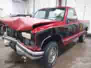 1990 GMC Sierra 1500 z VIN 1GTDK14K7LE522631, wystawiony jako IAAI lot #41424510 z przebiegiem 263 201 mil mil oraz . Historia ofert i sprzedaży dostępna na DreamBid. Obrazek 2.