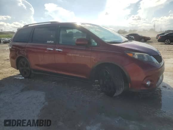 2014 Toyota Sienna SE with VIN 5TDXK3DC5ES442131, listed as a Copart auction lot 87235315 with 98,342 mi miles and Clean title. Bid and sale history available at DreamBid. Image 4.