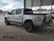 2007 Toyota Tacoma z VIN 3TMLU42N97M011152, wystawiony jako Copart lot #85270725 z przebiegiem 226 305 mil mil oraz Szkoda całkowita • Salvage title. Historia ofert i sprzedaży dostępna na DreamBid. Obrazek 2.