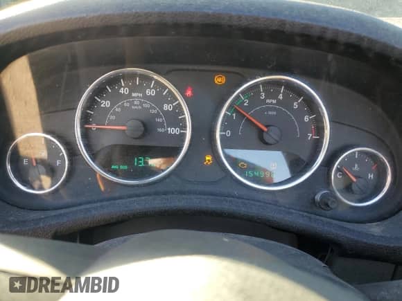 2012 Jeep Wrangler Sport z VIN 1C4AJWAG3CL258130, wystawiony jako Copart lot #86983635 z przebiegiem 154 996 mil mil oraz Czysty tytuł • Clean title. Historia ofert i sprzedaży dostępna na DreamBid. Obrazek 9.