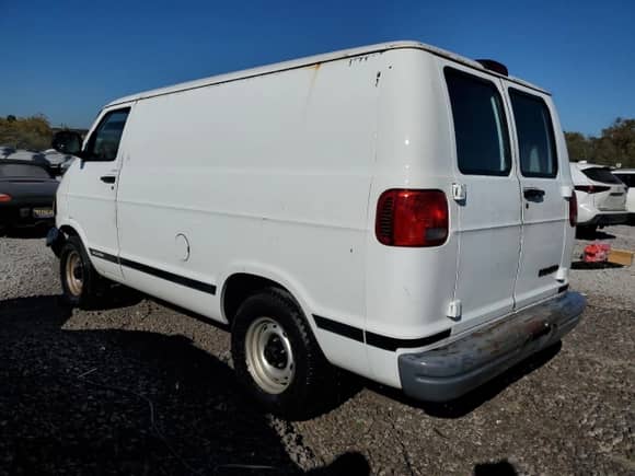 1999 Dodge Cargo with VIN 2B7HB11X9XK530023, listed as a Copart auction lot 76975974 with 219,842 mi miles and Salvage title. Bid and sale history available at DreamBid. Image 2.