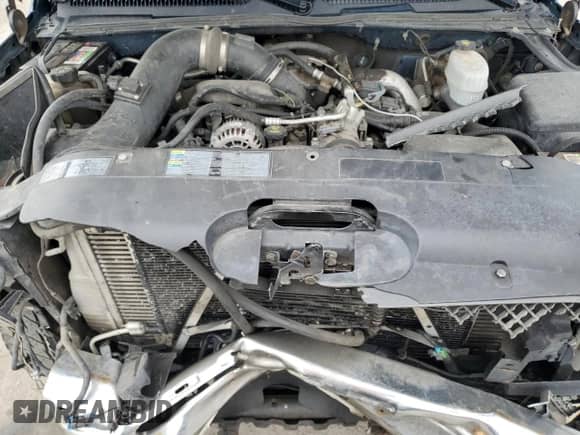 2005 Chevrolet Silverado 2500HD LS z VIN 1GCHK23275F842523, wystawiony jako Copart lot #58774865 z przebiegiem 247 536 mil mil oraz Szkoda całkowita • Salvage title. Historia ofert i sprzedaży dostępna na DreamBid. Obrazek 11.