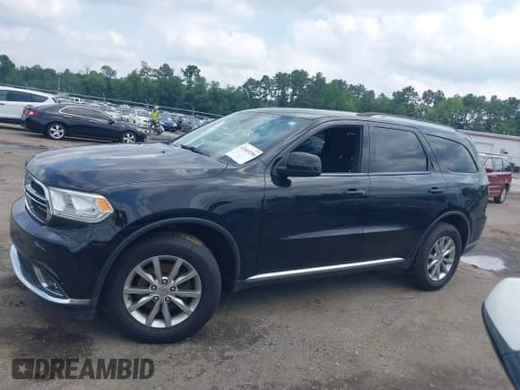 2017 Dodge Durango SXT with VIN 1C4RDJAG7HC860405, listed as a IAAI auction lot 42669206 with 165,936 mi miles and . Bid and sale history available at DreamBid. Image 14.
