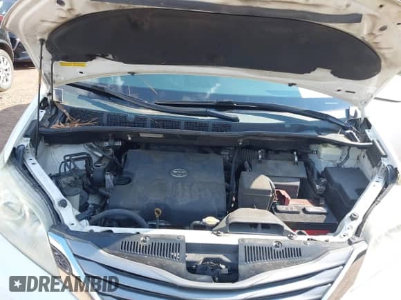 2011 Toyota Sienna XLE AAS with VIN 5TDYK3DC9BS132502, listed as a IAAI auction lot 43180013 with 212,756 mi miles and . Bid and sale history available at DreamBid. Image 10.