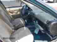 1991 Honda Accord EX z VIN JHMCB7560MC063583, wystawiony jako IAAI lot #42563870 z przebiegiem 226 798 mil mil oraz . Historia ofert i sprzedaży dostępna na DreamBid. Obrazek 5.