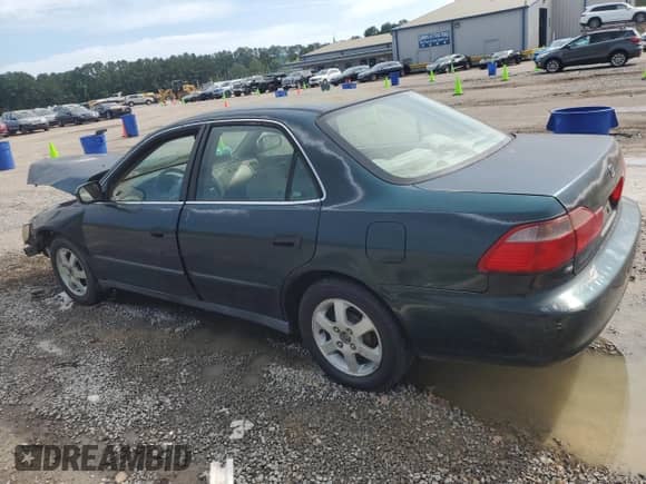 2000 Honda Accord SE with VIN 1HGCG5674YA073633, listed as a Copart auction lot 61041925 with 205,548 mi miles and Salvage title. Bid and sale history available at DreamBid. Image 2.