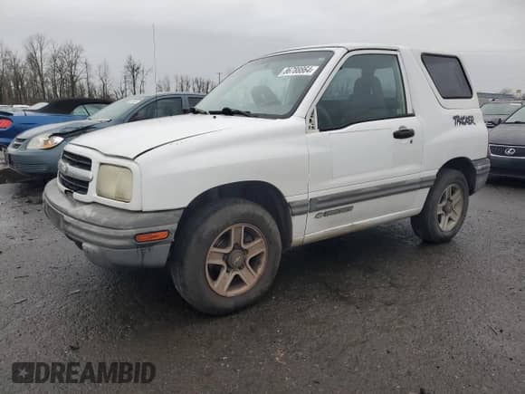 2002 Chevrolet Tracker with VIN 2CNBE18CX26926779, listed as a Copart auction lot 86788864 with 172,966 mi miles and Salvage title. Bid and sale history available at DreamBid. Image 1.