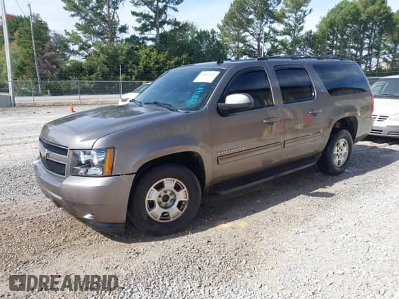 2011 Chevrolet Suburban LT z VIN 1GNSCJE09BR344091, wystawiony jako IAAI lot #43487649 z przebiegiem 182 652 mil mil oraz . Historia ofert i sprzedaży dostępna na DreamBid. Obrazek 17.