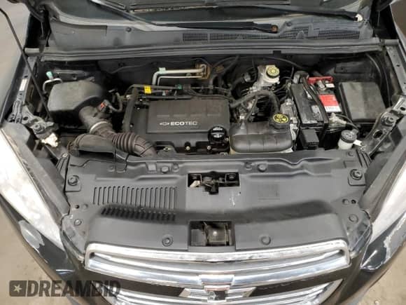 2015 Chevrolet Trax LS z VIN KL7CJPSB8FB094074, wystawiony jako Copart lot #90316275 z przebiegiem 176 376 mil mil oraz Czysty tytuł • Clean title. Historia ofert i sprzedaży dostępna na DreamBid. Obrazek 12.