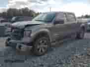2013 Ford F-150 Lariat with VIN 1FTFW1ET6DFA23450, listed as a Copart auction lot 71629705 with 213,830 mi miles and Salvage title. Bid and sale history available at DreamBid. Image 1.