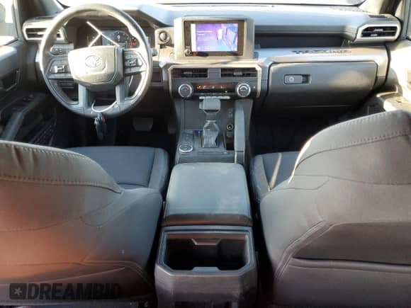 2025 Toyota Tacoma SR5 with VIN 3TMKB5FNXSM034398, listed as a Copart auction lot 69094555 with 5,009 mi miles and Salvage title. Bid and sale history available at DreamBid. Image 8.