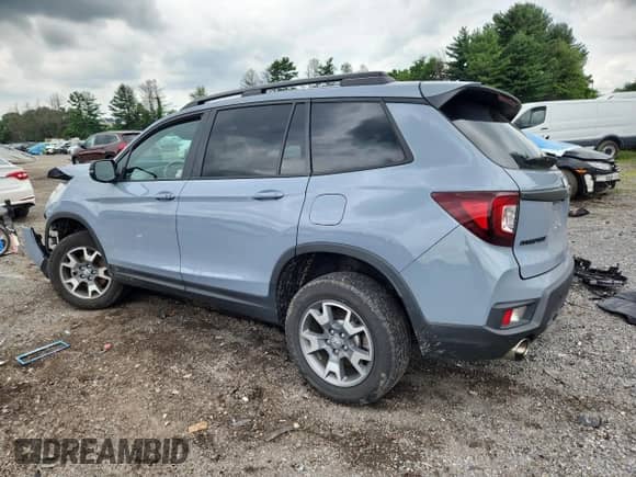 2023 Honda Passport TrailSport с VIN 5FNYF8H63PB022336, выставлен на аукционе Copart как лот 63269705 с пробегом Не указан миль и Списание • Salvage title. История ставок и продаж доступна на DreamBid. Изображение 2.