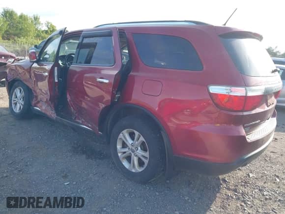 2013 Dodge Durango Crew with VIN 1C4SDJDT8DC608702, listed as a IAAI auction lot 43109254 with 181,278 mi miles and . Bid and sale history available at DreamBid. Image 3.