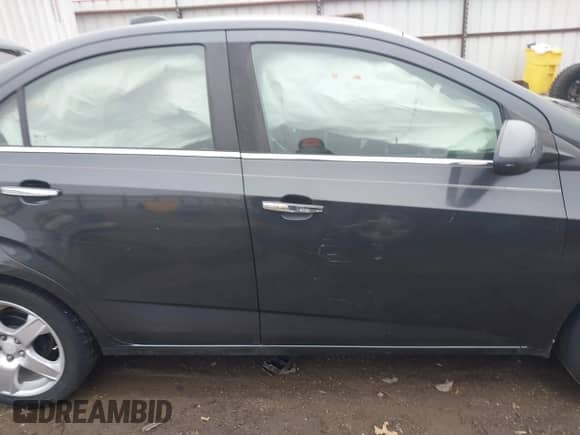 2016 Chevrolet Sonic LTZ with VIN 1G1JE5SBXG4133751, listed as a IAAI auction lot 41527209 with 151,561 mi miles and . Bid and sale history available at DreamBid. Image 14.