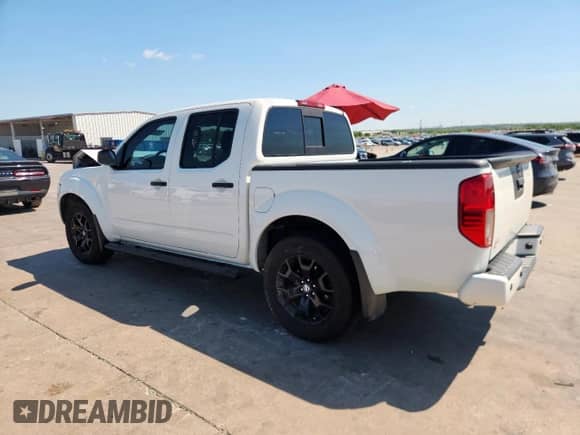 2021 Nissan Frontier SV with VIN 1N6ED0EA7MN723443, listed as a Copart auction lot 71290275 with 57,013 mi miles and Salvage title. Bid and sale history available at DreamBid. Image 2.
