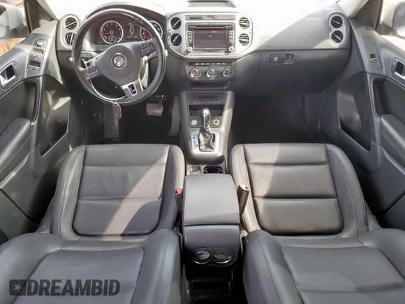 2014 Volkswagen Tiguan S with VIN WVGAV3AX2EW543398, listed as a Copart auction lot 67066455 with 111,277 mi miles and Clean title. Bid and sale history available at DreamBid. Image 8.