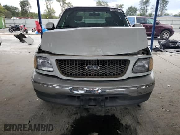 2002 Ford F-150 XL с VIN 1FTRX17L72NB31506, выставлен на аукционе Copart как лот 83773615 с пробегом Не указан миль и Списание • Salvage title. История ставок и продаж доступна на DreamBid. Изображение 5.