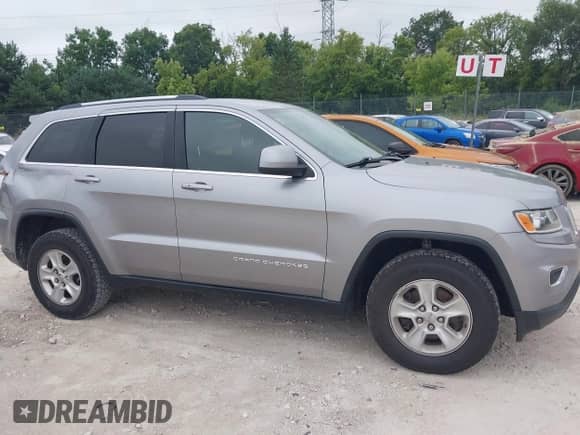 2016 Jeep Grand Cherokee Laredo with VIN 1C4RJFAG1GC478116, listed as a IAAI auction lot 43036998 with 131,945 mi miles and . Bid and sale history available at DreamBid. Image 14.