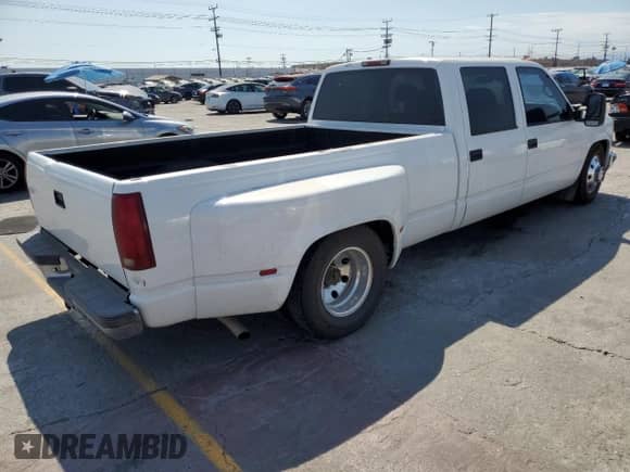 1999 Chevrolet Silverado 3500 with VIN 1GCHC33J7XF024092, listed as a Copart auction lot 64849475 with 188,547 mi miles and Non repairable. Bid and sale history available at DreamBid. Image 3.