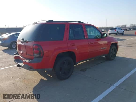 2002 Chevrolet TrailBlazer LTZ z VIN 1GNDT13S422163650, wystawiony jako IAAI lot #42063356 z przebiegiem Nie podano mil oraz . Historia ofert i sprzedaży dostępna na DreamBid. Obrazek 4.
