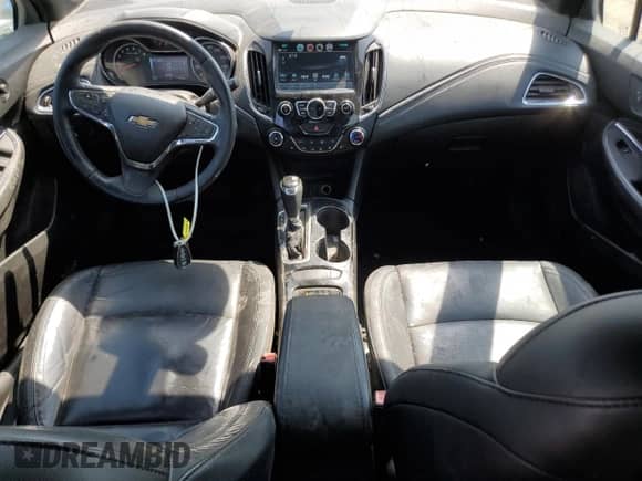 2017 Chevrolet Cruze Premier z VIN 3G1BF6SM7HS577549, wystawiony jako Copart lot #69048945 z przebiegiem 233 394 mil mil oraz Szkoda całkowita • Salvage title. Historia ofert i sprzedaży dostępna na DreamBid. Obrazek 8.