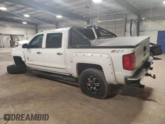 2017 Chevrolet Silverado 1500 LTZ z VIN 3GCUKSEJ6HG169441, wystawiony jako Copart lot #61245275 z przebiegiem 56 906 mil mil oraz Szkoda całkowita • Salvage title. Historia ofert i sprzedaży dostępna na DreamBid. Obrazek 2.