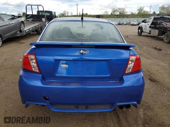 2012 Subaru WRX WRX with VIN JF1GV7E6XCG023762, listed as a Copart auction lot 56332545 with 127,263 mi miles and Salvage title. Bid and sale history available at DreamBid. Image 6.