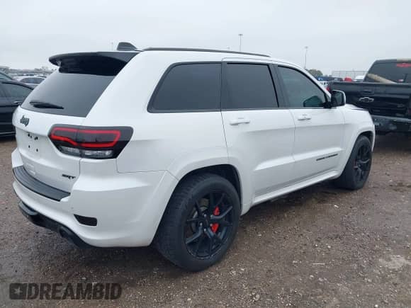 2016 Jeep Grand Cherokee SRT with VIN 1C4RJFDJ0GC456325, listed as a IAAI auction lot 41425211 with 159,746 mi miles and . Bid and sale history available at DreamBid. Image 4.