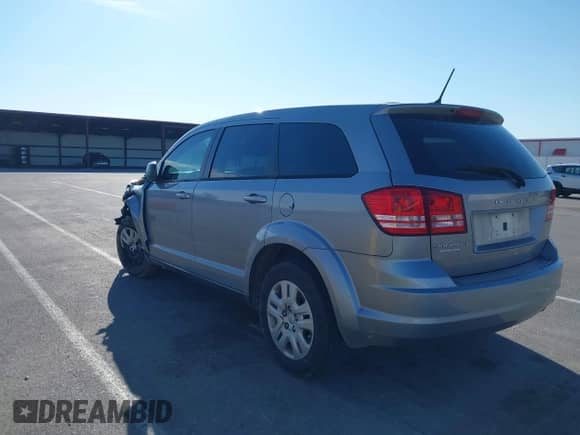 2015 Dodge Journey SE with VIN 3C4PDCAB9FT542634, listed as a IAAI auction lot 39026838 with 127,136 mi miles and . Bid and sale history available at DreamBid. Image 3.