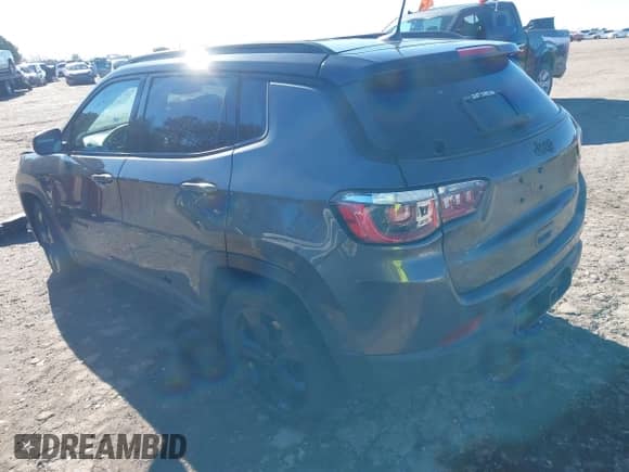 2020 Jeep Compass Latitude with VIN 3C4NJCBB8LT141103, listed as a IAAI auction lot 41263757 with 128,272 mi miles and . Bid and sale history available at DreamBid. Image 3.