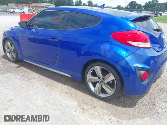 2013 Hyundai Veloster Turbo с VIN KMHTC6AE2DU163910, выставлен на аукционе IAAI как лот 42880099 с пробегом 244 002 миль миль и . История ставок и продаж доступна на DreamBid. Изображение 3.