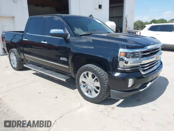 2016 Chevrolet Silverado 1500 High Country z VIN 3GCUKTEC0GG363629, wystawiony jako IAAI lot #42742870 z przebiegiem 82 715 mil mil oraz . Historia ofert i sprzedaży dostępna na DreamBid. Obrazek 1.