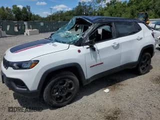 2023 Jeep Compass Trailhawk с VIN 3C4NJDDN4PT527911, выставлен на аукционе Copart как лот 62719855 с пробегом Не указан миль и На запчасти • Non repairable. История ставок и продаж доступна на DreamBid. Изображение 1.