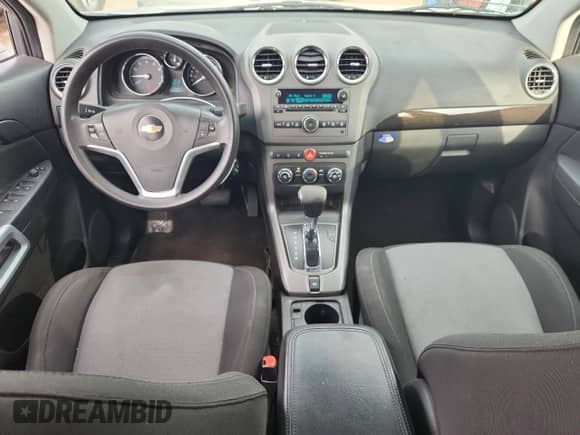 2014 Chevrolet Captiva Sport LS с VIN 3GNAL1EK6ES613551, выставлен на аукционе Copart как лот 81738865 с пробегом 127 424 миль миль и Списание • Salvage title. История ставок и продаж доступна на DreamBid. Изображение 8.